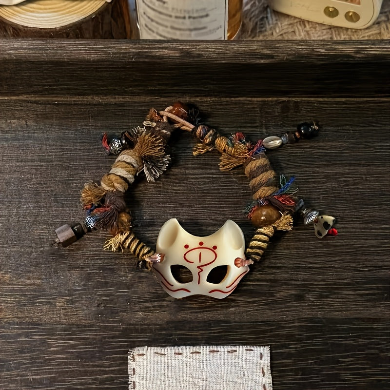 A Vintage Tribal Fox Mask Beaded Bracelet Featuring a Woven Rope Design in Tibetan Style, Serving As a Good Luck Charm. It'S Suitable for Everyday Wear Throughout The Seasons And Makes a Unique Accessory. This Is an Ideal Val
