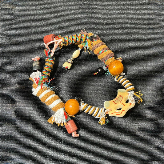 A Vintage Tribal Fox Mask Beaded Bracelet Featuring a Woven Rope Design in Tibetan Style, Serving As a Good Luck Charm. It'S Suitable for Everyday Wear Throughout The Seasons And Makes a Unique Accessory. This Is an Ideal Val