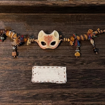 A Vintage Tribal Fox Mask Beaded Bracelet Featuring a Woven Rope Design in Tibetan Style, Serving As a Good Luck Charm. It'S Suitable for Everyday Wear Throughout The Seasons And Makes a Unique Accessory. This Is an Ideal Val